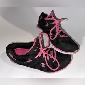 Black and pink champion running sneakers